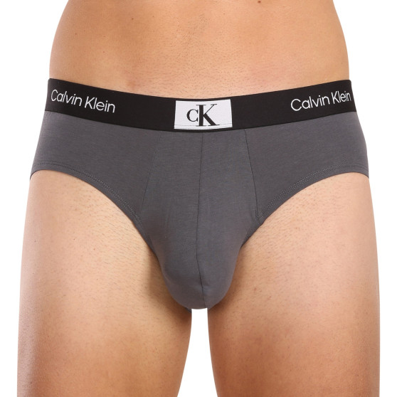 7PACK muške slip gaće Calvin Klein višebojan (NB3581A-IUI)