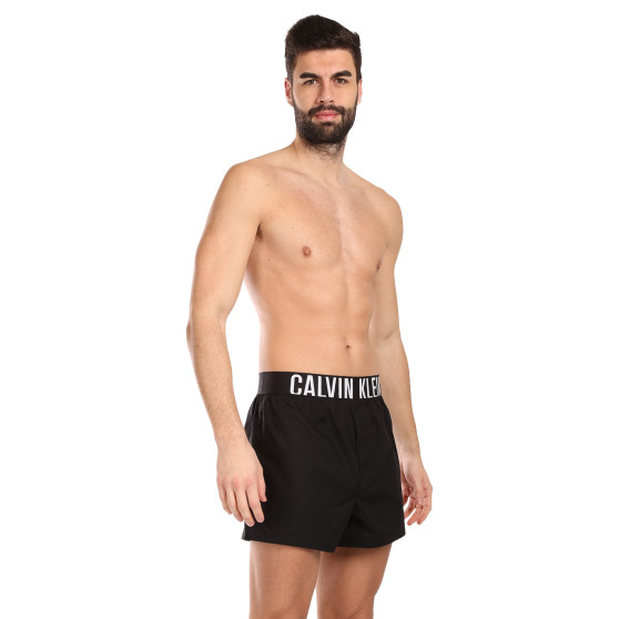 2PACK muške bokserice Calvin Klein višebojan (NB3833A-OG4)